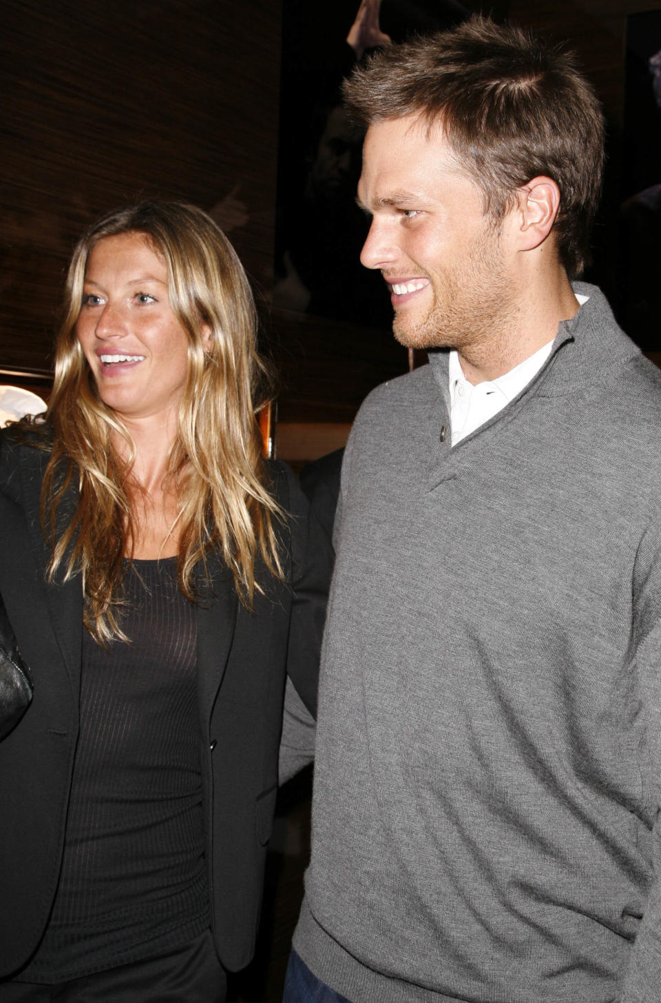 With Gisele Bundchen, now his wife,&nbsp;at the opening of the Ermenegildo Zegna Global Store on 5th Avenue on March 11, 2008, in New York City.