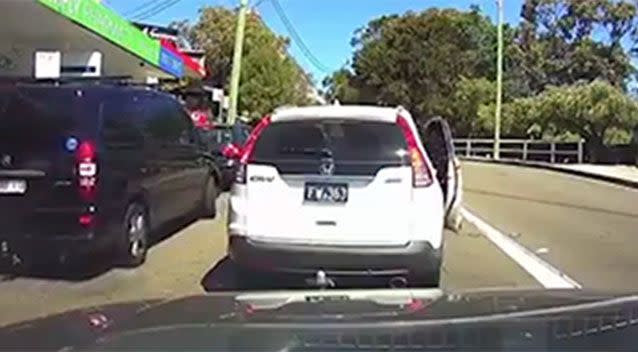 A Honda stopped at an intersection, blocking the car behind, which honks its horn impatiently, in Malabar, NSW.Picture: Dash Cam Owners Australia Facebook