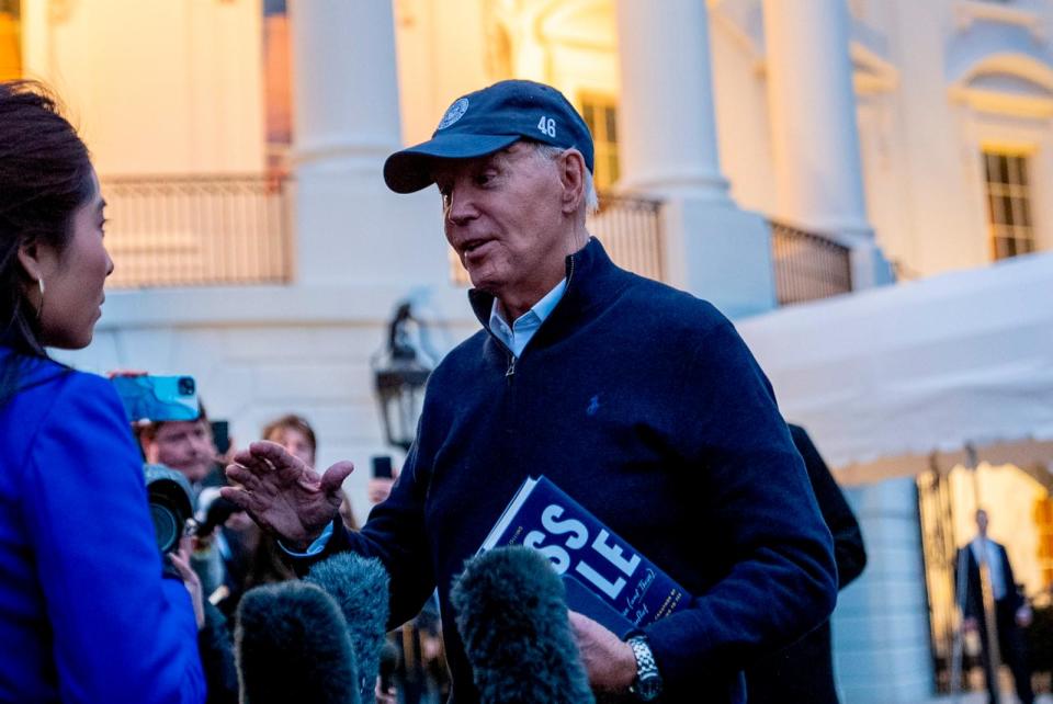PHOTO: President Joe Biden speaks to members of the media before boarding Marine One on the South Lawn of the White House in Washington, Friday, March 1, 2024, to travel to Camp David, Md., for the weekend. (Andrew Harnik/AP)