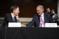 Sen. Ed Markey, D-Mass., right, shakes hands with U.S. Ambassador to China nominee Nicholas Burns after speaking in support of Burns' nomination during a Senate Foreign Relations Committee hearing on Capitol Hill in Washington, Wednesday, Oct. 20, 2021. (AP Photo/Patrick Semansky)