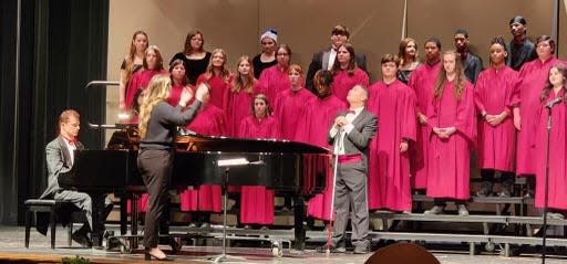 The MHS Choirs are shown with piano accompanist Robert Duris, who is in his first year at Monroe High School.
“I also accompany the choirs for Ottawa Hills High School/Middle School and am the worship director at First Congregational Church in Toledo,” Duris said.