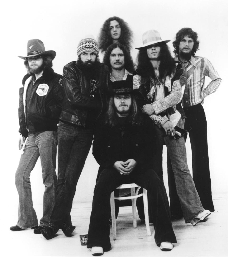 Lynyrd Skynyrd (L-R - Leon Wilkeson, Artimus Pyle, Billy Powell, Allen Collins (top), Ronnie Van Zant (seated, Gary Rossington and Steve Gaines pose for an MCA Records publicity still circa 1976