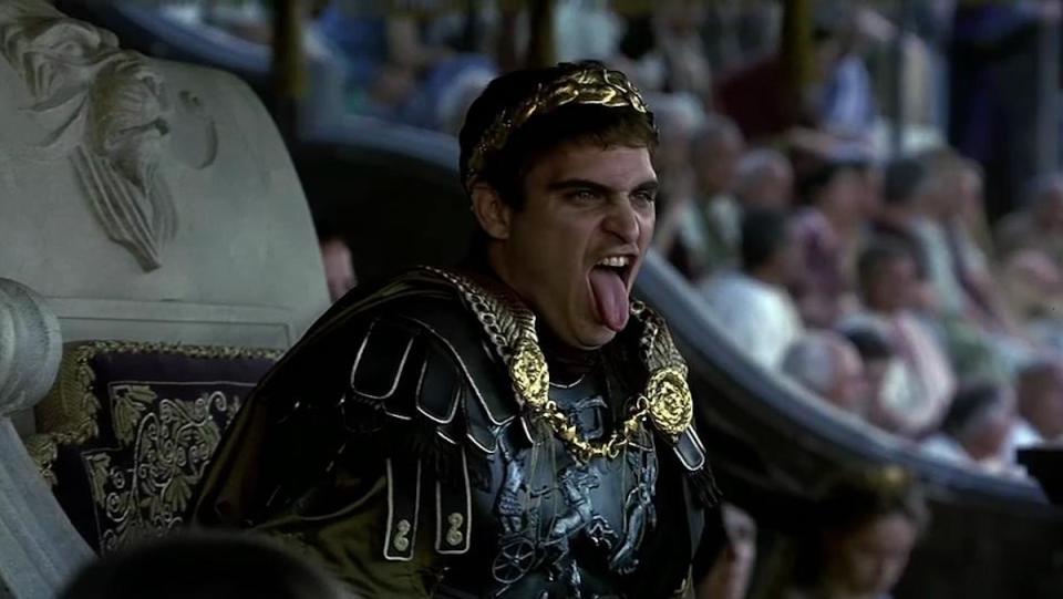 Commodus sticks out his tongue from his box at the Colosseum in Gladiator