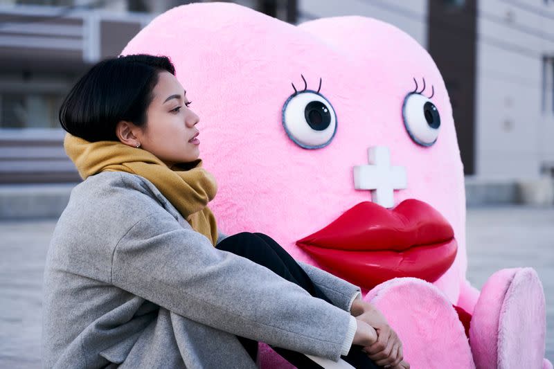 Actor Fumi Nikaido and the character ‘Little Miss Period’ are seen in this undated image from the movie Little Miss Period, released by Yoshimoto Kogyo Co.