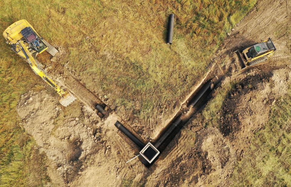 Some of 3,000 feet of irrigation pipeline is being installed to replace ditches on the New Harvey pastures in Davis County on Wednesday, Oct. 11, 2023. The Nature Conservancy in Utah is improving the flood irrigation system on the 200 acres that is part of the Great Salt Lake Shorelands Preserve. | Jeffrey D. Allred, Deseret News