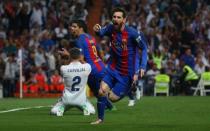 Football Soccer - Real Madrid v FC Barcelona - Spanish Liga Santander - Santiago Bernabeu, Madrid, Spain - 23/4/17 Barcelona's Lionel Messi celebrates scoring their third goal Reuters / Stringer Livepic