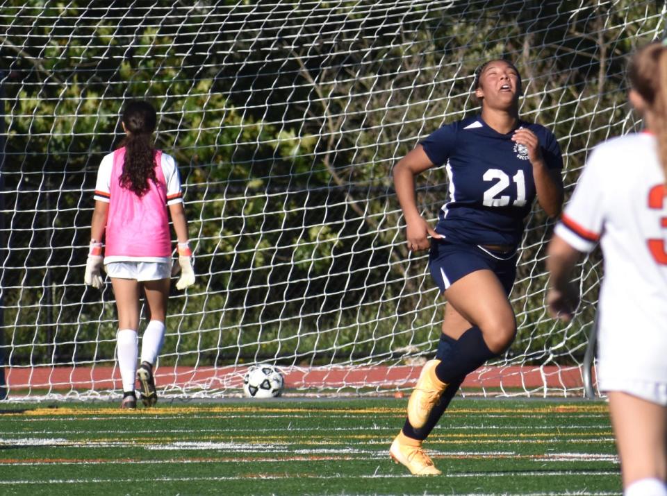 Atlantis Charter's Destiny Rodney celebrates after scoring the eventual game winning goal against Avon on Tuesday at Atlantis Charter high school.