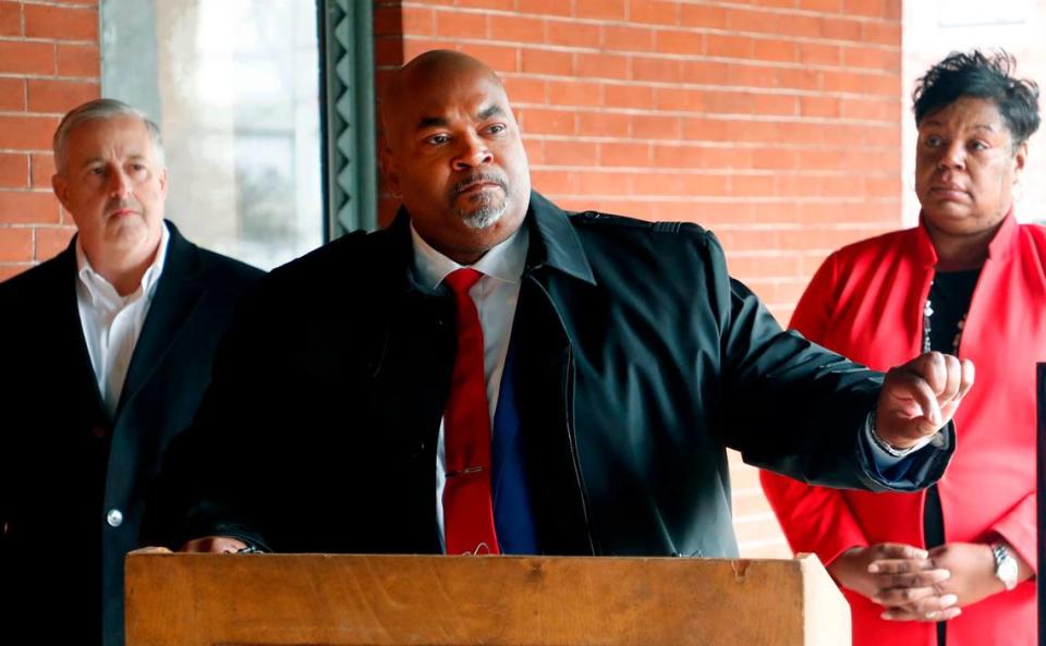 N.C. Lt. Gov. Mark Robinson, center, speaks during a press conference. On the right is his wife, Yolanda Hill, whose nonprofit Balanced Nutrition is under scrutiny from N.C. DHHS.