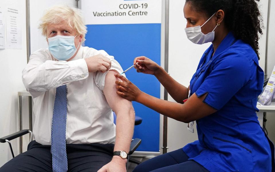 Boris Johnson pictured receiving a Covid-19 vaccinatio