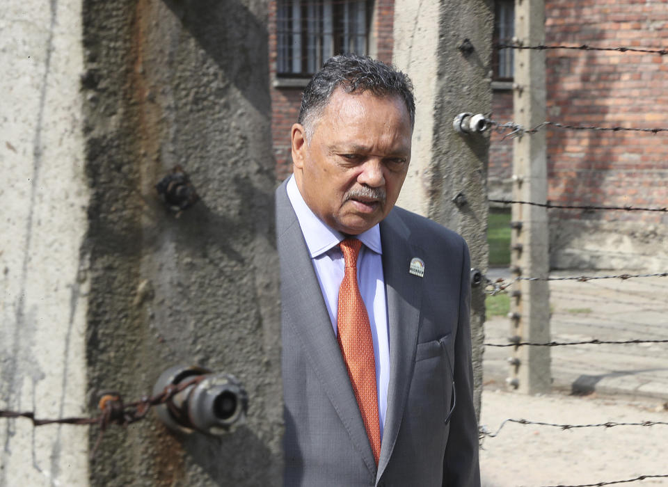 The American civil rights activist Rev. Jesse Jackson visits the former Nazi death camp of Auschwitz-Birkenau in Oswiecim, Poland on Friday, Aug. 2, 2019. Rev. Jesse Jackson gathered Friday with survivors at the former Nazi death camp of Auschwitz-Birkenau to commemorate an often forgotten genocide — that of the Roma people. In addition to the 6 million Jews killed in camps such as Auschwitz, the Nazis killed other minorities during World War II, including between 250,000 and 500,000 Roma and Sinti. (AP Photo/Czarek Sokolowski)