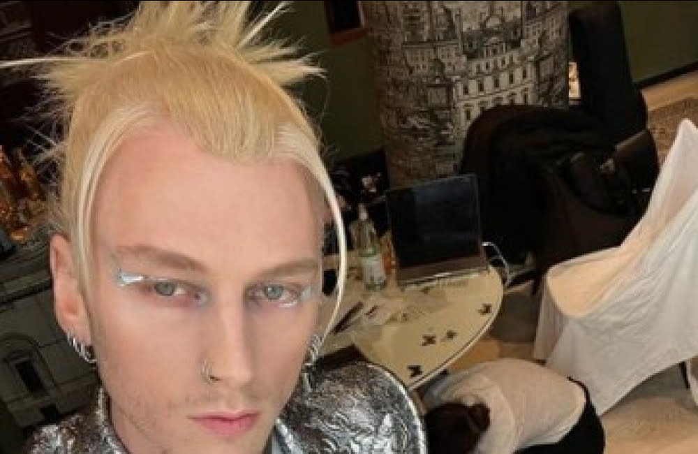 Machine Gun Kelly said their comments about his style were a reflection of their 'own insecurities' credit:Bang Showbiz