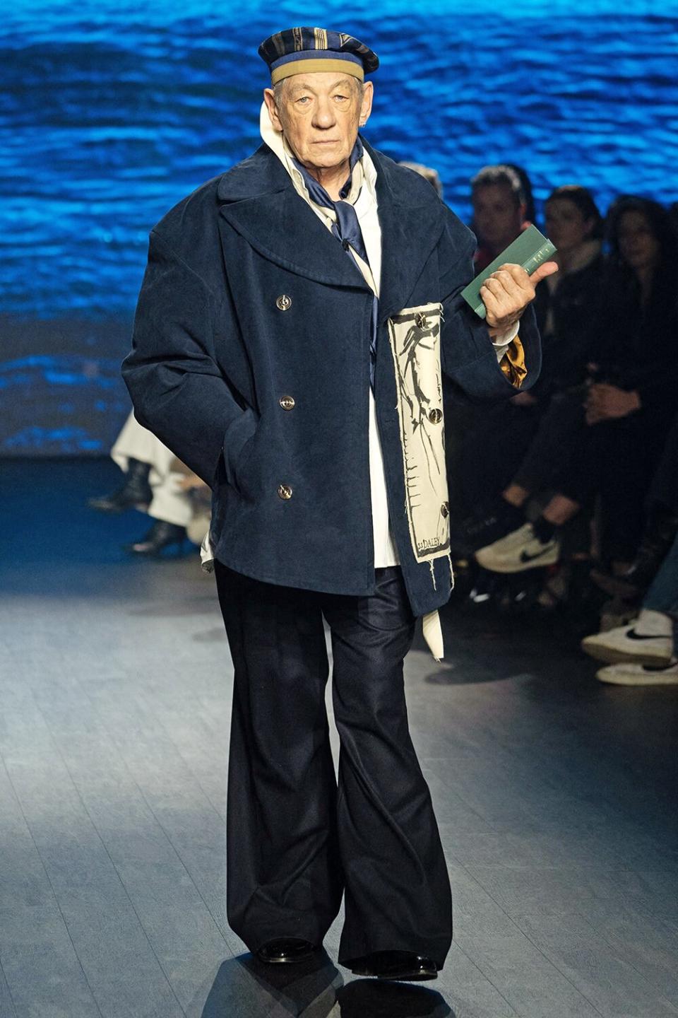 TOPSHOT - British actor Ian McKellen attends British fashion label S.S.Daley's Autumn/Winter 2023 collection catwalk show on the third day of the London Fashion Week, in London, on February 19, 2023. - RESTRICTED TO EDITORIAL USE (Photo by Niklas HALLE'N / AFP) / RESTRICTED TO EDITORIAL USE (Photo by NIKLAS HALLE'N/AFP via Getty Images)