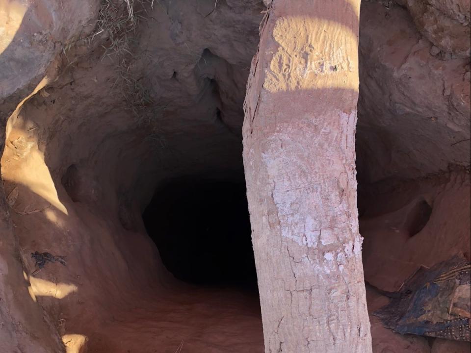 A makeshift tunnel to dig for cobalt in the DRC. It is unclear how many Congolese mine workers have died in tunnel collapses as their deaths are rarely recorded or even acknowledged (Siddharth Kara)