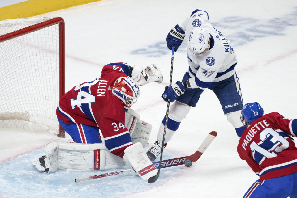 Montreal Canadiens goaltender Jake Allen stops Tampa Bay Lightning's Alex Killorn during the second period of an NHL hockey game Tuesday, Dec. 7, 2021, in Montreal. (Paul Chiasson/The Canadian Press via AP)
