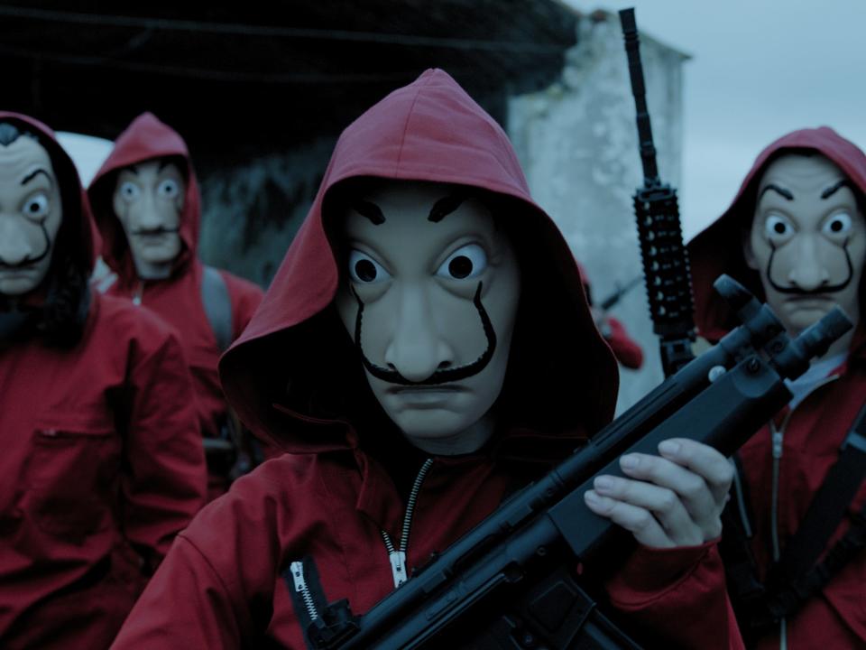 <p>The Dalí masks and red boilersuits of ‘Money Heist’ have become a symbol of resistance beyond the series, having been used in political protests in Puerto Rico </p>Netflix