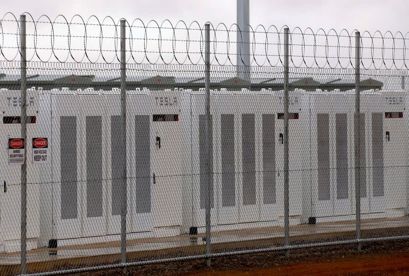 FILE PHOTO: A fence surrounds the Hornsdale Power Reserve, featuring a lithium-ion battery made by Tesla, near the South Australian town of Jamestown