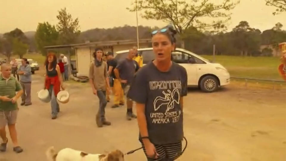 This still image taken from video provided by AuBC, angry residents confront Australian Prime Minister Scott Morrison as he visited a wildfire-ravaged Cobargo, in New South Wales on Thursday, Jan. 2, 2020. The outpouring of anger came as authorities said 381 homes had been destroyed on the New South Wales southern coast this week. More than 200 fires are burning in Australia's two most-populous states. ( AuBC via AP)