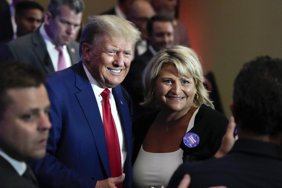 Republican presidential candidate former president Donald Trump greets supporters after speaking at the Republican Party of Iowa's 2023 Lincoln Dinner in Des Moines, Iowa, Friday, July 28, 2023. (AP Photo/Charlie Neibergall)