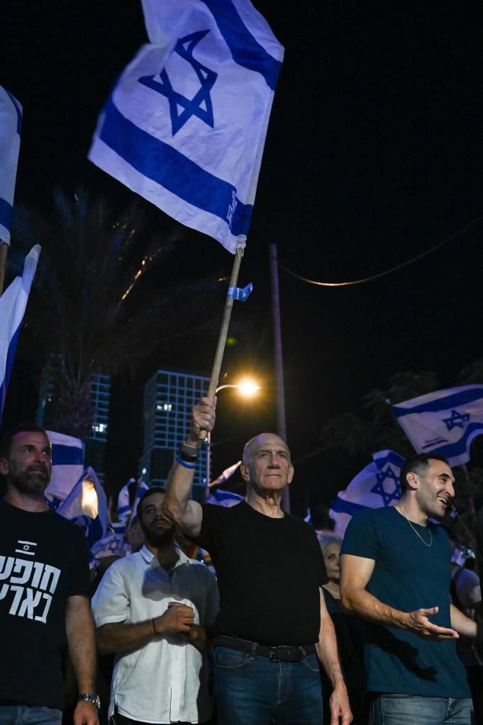 TEL AVIV, ISRAEL - JULY 11: Former Prime Minister of Israel Ehud Olmert attends a protest against the Israeli government’s plan to overhaul the justice system on July 11, 2023 in Tel Aviv, Israel. Protest leaders called for a ‘Day of Resistance' after the coalition moved forward with it's planned judicial reforms.  (Photo by Noam Galai/Getty Images)