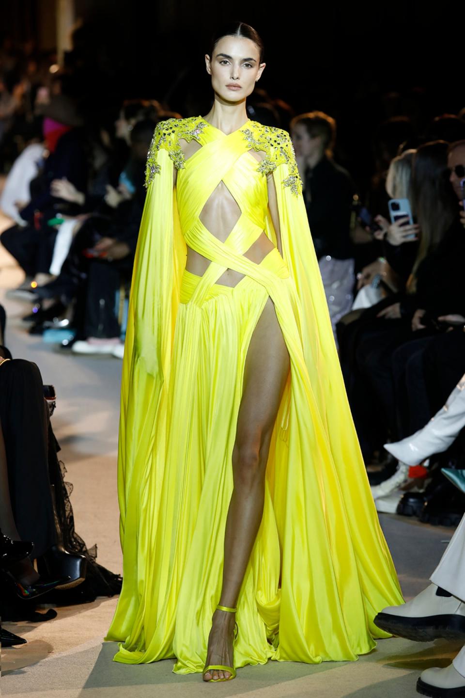 Model wearing Zuhair Murad Spring 2023 Couture yellow gown