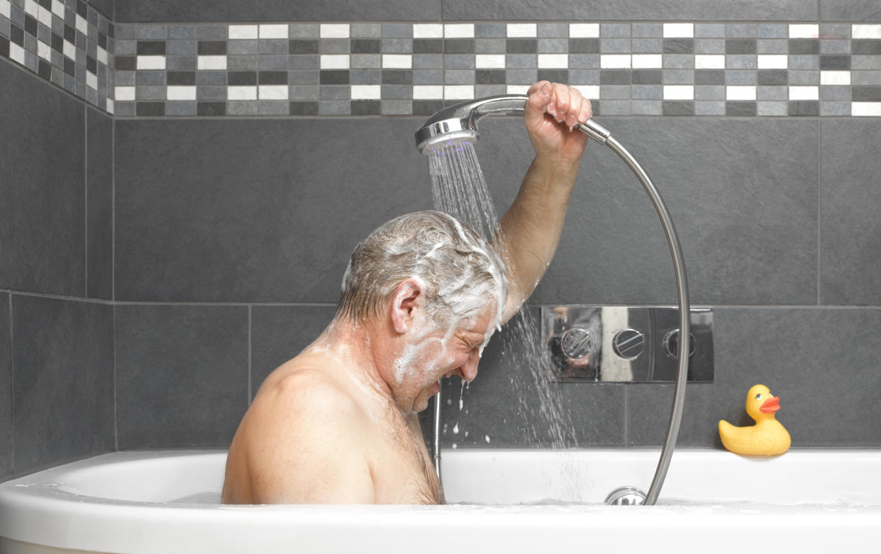 Man in bath tub. (Getty Images)