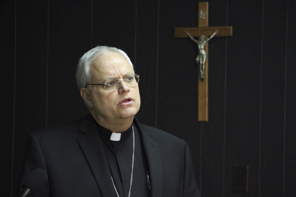 Catholic Bishop Andrew Bellisario speaks at a news conference Thursday, Jan. 16, 2020, in Anchorage, Alaska, announcing a review commissioned by the Archdiocese of Anchorage found credible evidence of sexual misconduct by 14 people who served in the archdiocese dating to 1966. The commission was charged with reviewing personnel files of "clerics and religious men and women" who served in the archdiocese dating to 1966, as well as reviewing allegations of sexual misconduct of lay volunteers and employees reported to the archdiocese. (AP Photo/Mark Thiessen)