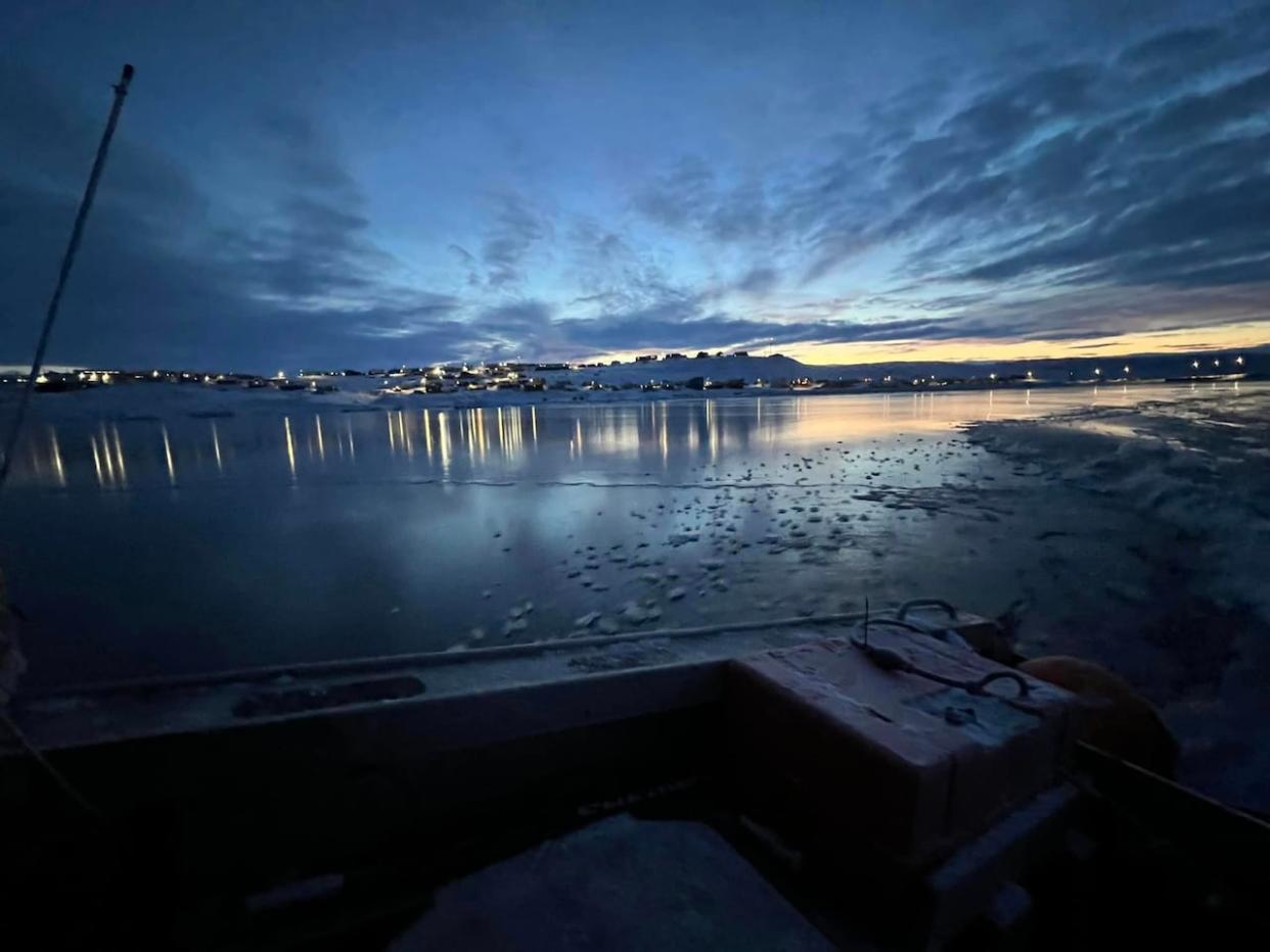 A view of Pond Inlet, Nunavut, on Dec. 5, from a boat. (Christopher Atagootak/Facebook - image credit)