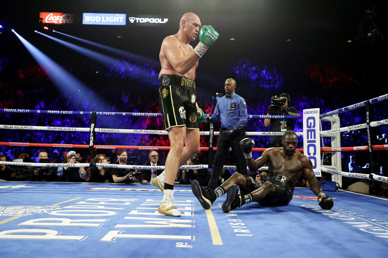 LAS VEGAS, NEVADA - FEBRUARY 22:  Tyson Fury knocks down Deontay Wilder in the fifth round during their Heavyweight bout for Wilder's WBC and Fury's lineal heavyweight title on February 22, 2020 at MGM Grand Garden Arena in Las Vegas, Nevada.  (Photo by Al Bello/Getty Images)