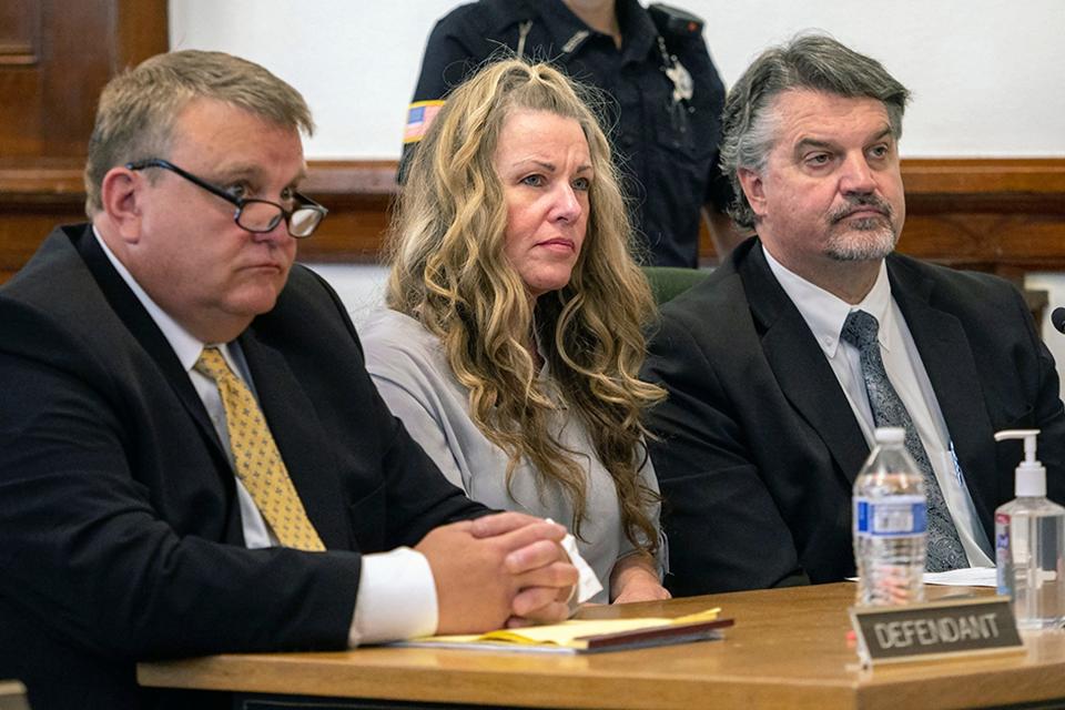 Lori Vallow Daybell, center, sits between her attorneys for a hearing at the Fremont County Courthouse in St. Anthony, Idaho.