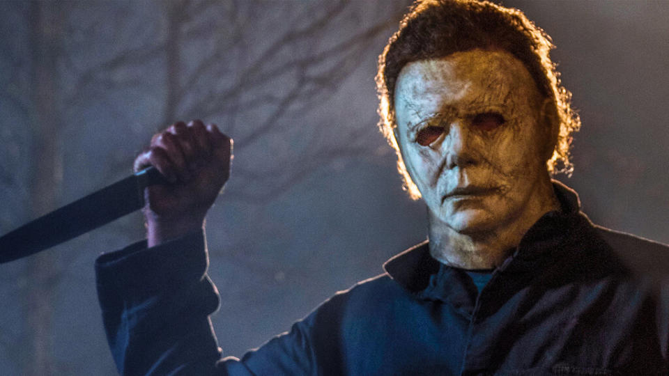 Michael Myers holding a knife in still from Halloween movie. Image via Universal Pictures