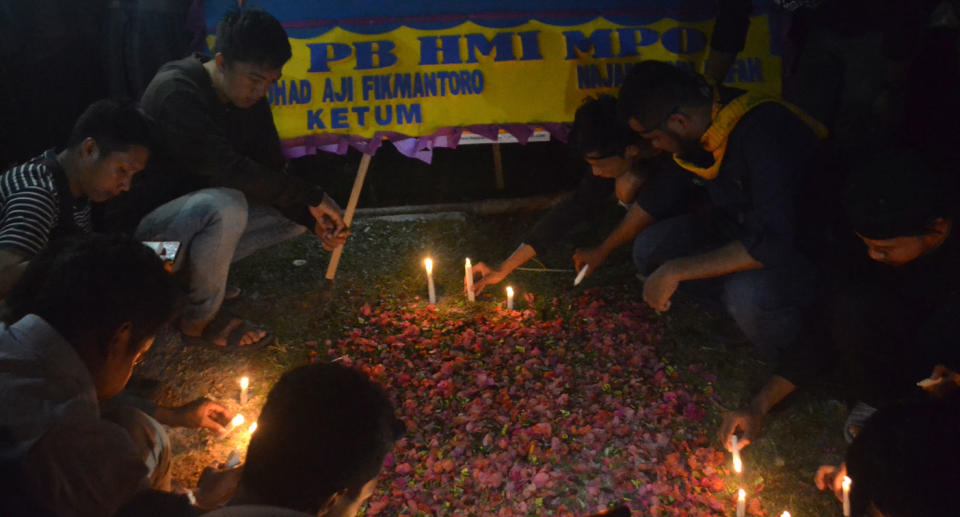 Students mourn death of friends killed in Indonesian riots protesting proposed sex ban laws.