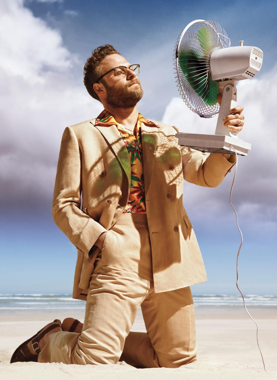 <cite class="credit">Suit, $2,545, by Paul Stuart / Shirt, $158, by SSS World Corp/ Sandals, $210, by Grenson / Glasses, his own</cite>