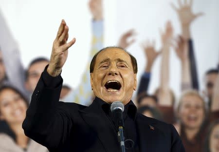 FILE PHOTO - Forza Italia party (PDL) leader Silvio Berlusconi speaks during Northern League rally in Bologna, central Italy, November 8, 2015. REUTERS/Stefano Rellandini/File Photo