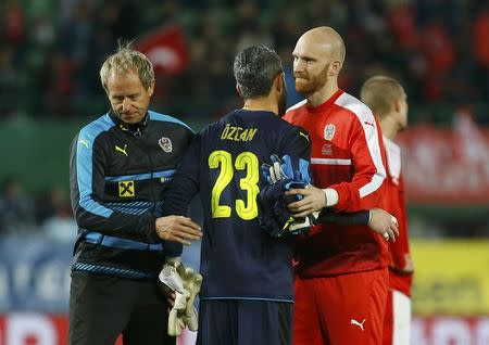 Football Soccer - Austria v Turkey - International friendly - Ernst Happel stadium, Vienna, Austria - 29/03/16. Austria's Klaus Lindenberger, Ramazan Oezcan and Robert Almer react REUTERS/Heinz-Peter Bader