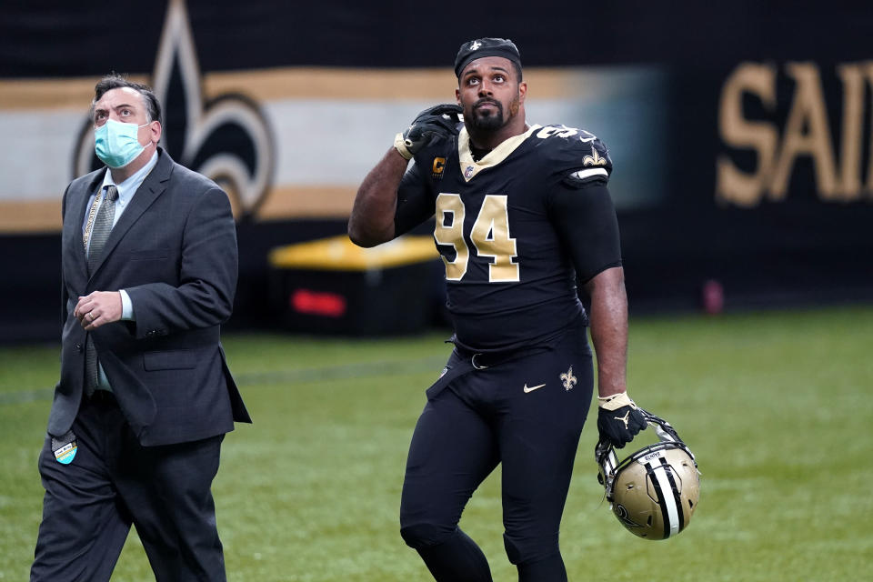 New Orleans Saints defensive end Cameron Jordan (94) walks off the field after being ejected from the game in the second half of an NFL football game against the Kansas City Chiefs in New Orleans, Sunday, Dec. 20, 2020. (AP Photo/Butch Dill)