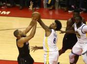 May 16, 2018; Houston, TX, USA; Golden State Warriors guard Nick Young (6) defends against Houston Rockets guard Eric Gordon (10) during the second half in game two of the Western conference finals of the 2018 NBA Playoffs at Toyota Center. Mandatory Credit: Troy Taormina-USA TODAY Sports