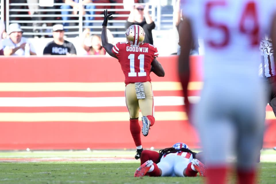 Goodwin points skyward after beating his defender for pace. Pic: Getty