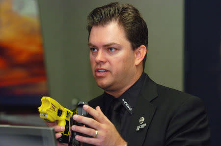 Taser International president Tom Smith speaks at the Reuters Aerospace and Defense Summit in Washington, DC, U.S., December 6, 2005. REUTERS/Jonathan Ernst/Files