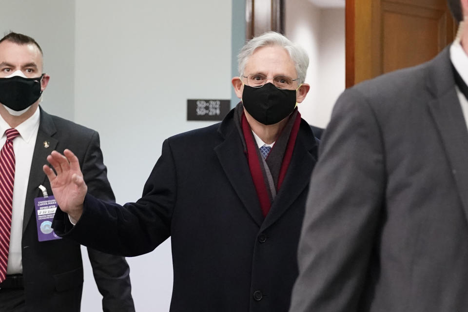 Judge Merrick Garland, President Joe Biden's pick to be attorney general, arrives on Capitol Hill for his confirmation hearing, in Washington, Monday, Feb. 22, 2021. (AP Photo/J. Scott Applewhite)