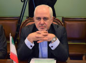 In this photo released by the Foreign Office, Iranian Foreign Minister Mohammad Javad Zarif, attends meeting with Pakistani officials at the Foreign Ministry in Islamabad, Pakistan, Friday, May 24, 2019. Zarif is in Pakistan Friday on a critically timed visit amid a crisis between Tehran and Washington and ahead of next week's emergency Arab League meeting called by Saudi Arabia as regional tensions escalate.(Pakistan Foreign Office via AP)