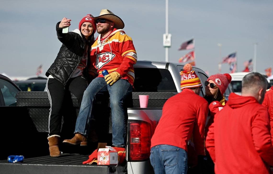 Dani and Wes Hoops of Gardner take a selfie while tailgating before the start of the AFC Championship Game between the Kansas City Chiefs and the Cincinnati Bengals at GEHA at Arrowhead Stadium on Sunday, Jan. 30, 2022.