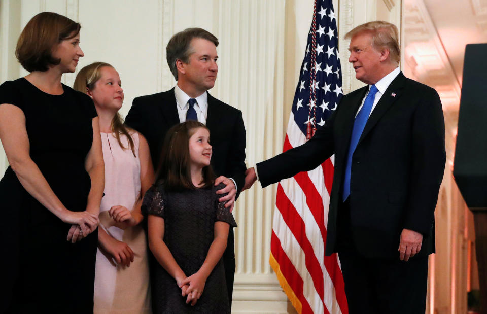 Kavanaugh with his family and Trump at the White House after the announcement. In light of Kavanaugh&rsquo;s rulings, some of his fellow Catholics are worried that key progressive victories of the past few decades&nbsp;will be under threat. (Photo: Leah Millis / Reuters)
