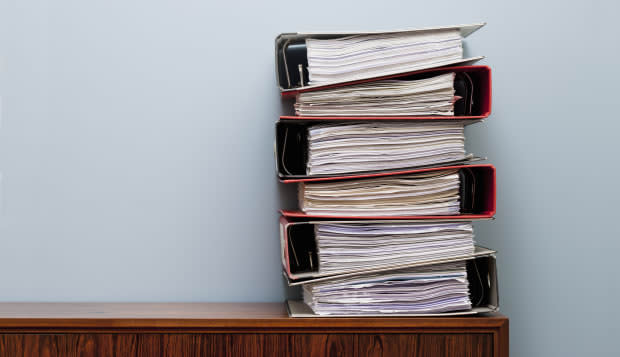 Ring binders on cabinet