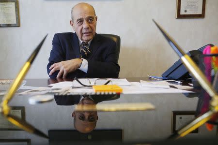 Vincent "Buddy" Cianci, former mayor and current mayoral candidate of Providence, answers a question during an interview with Reuters in his campaign headquarters in Providence, Rhode Island in this file photo taken August 12, 2014. REUTERS/Brian Snyder/Files