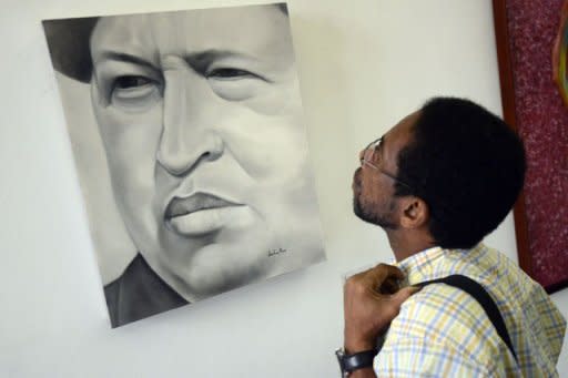 Un cuadro de la exposición 'Chávez vive y vencerá', expuesto en Caracas el 17 de enero de 2013