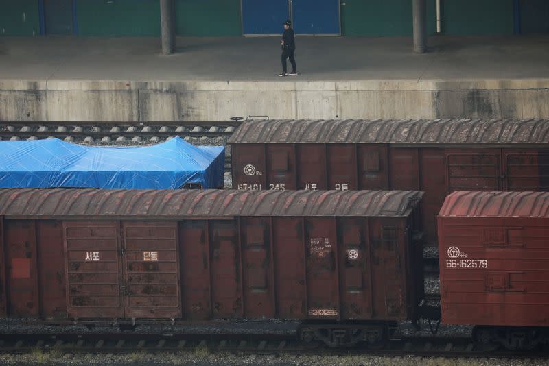 Freight cars with Korean characters are seen at a train station in Dandong