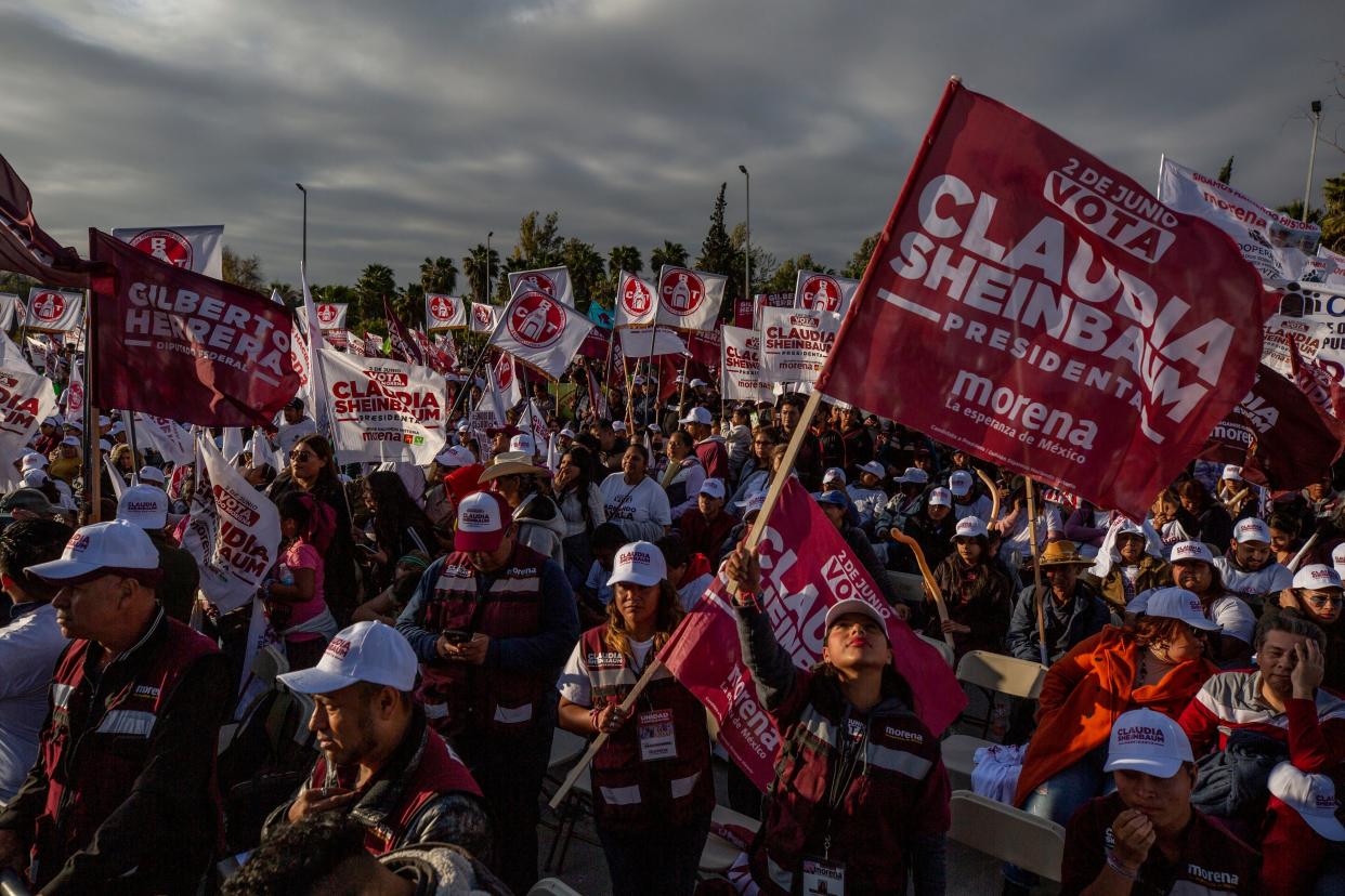 Supporters of Claudia Sheinbaum, the Mexican presidential candidate for the MORENA ruling party, attend a political rally at The Tromp Interactive Museum in the border city of Tijuana on Friday, April 12, 2024.