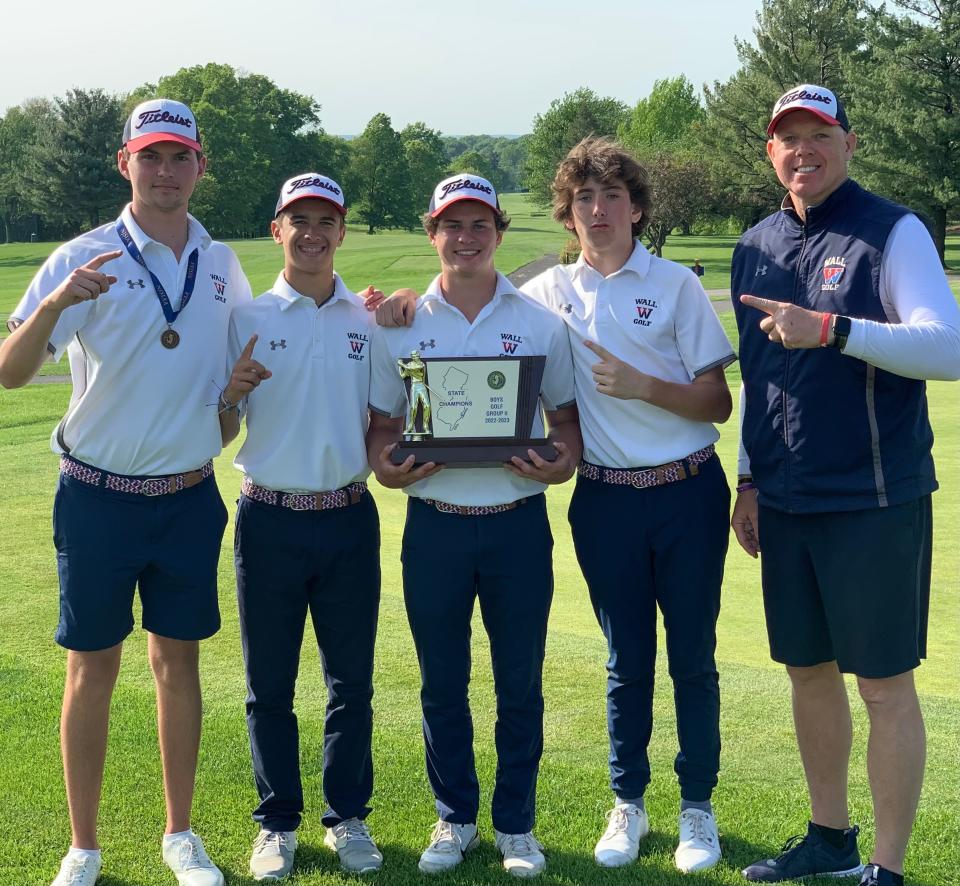 The Wall boys' golf team won the NJSIAA Group 2 championship on May 15, 2023 at Raritan Valley Country Club in Bridgewater, N.J. From left-to-right: Alex Menges; Boden Pepe;  Pat Scenna; Charlie Cormey; coach Matt Stefanski.