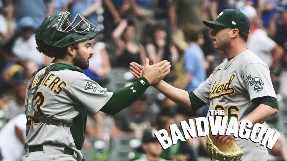 Jun 10, 2023; Milwaukee, Wisconsin, USA; Oakland Athletes pitcher Sam Long (66) and catcher Shea Langeliers (23) celebrate after beating the Milwaukee Brewers at American Family Field. Mandatory Credit: Benny Sieu-USA TODAY Sports