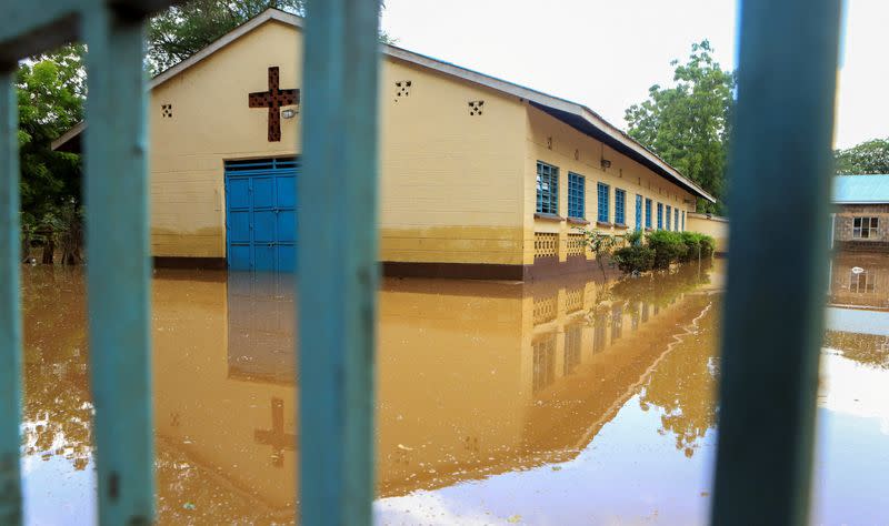 FILE PHOTO: Flood waters are seen within the Redeemed Gospel Church compound following heavy rains at Mororo village